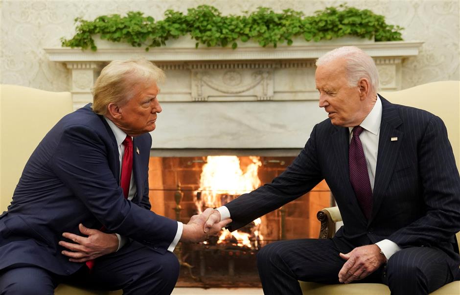 'Welcome back': Trump, Biden shake hands in White House